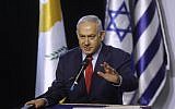 Prime Minister Benjamin Netanyahu delivers a speech during the 5th Israel-Greece-Cyprus summit, before the signing a trilateral agreements in cyber and innovation, on December 20, 2018 in Beersheba. (Menahem KAHANA / AFP)