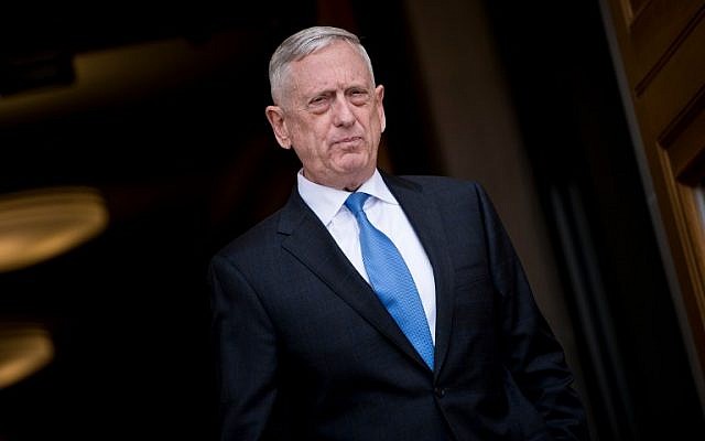 US Secretary of Defense James Mattis arrives to greet incoming National Security Adviser John Bolton, outside the Pentagon before a meeting in Washington, DC, March 29, 2018. (Brendan Smialowski/AFP)