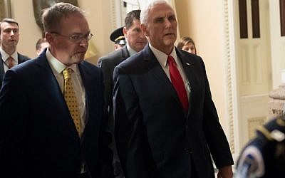 US Vice President Mike Pence and Mick Mulvaney (L), Director of the Office of Management and Budget (OMB) and incoming White House Chief of Staff, walk between meetings to discuss a possible government shutdown, at the US Capitol in Washington, DC, December 21, 2018. (SAUL LOEB / AFP)