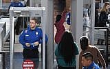 Illustrative: Transportation Security Administration (TSA) officers work unpaid on the first day of the US government shutdown, at LAX Airport in Los Angeles, California, on December 22, 2018. (Mark RALSTON / AFP)