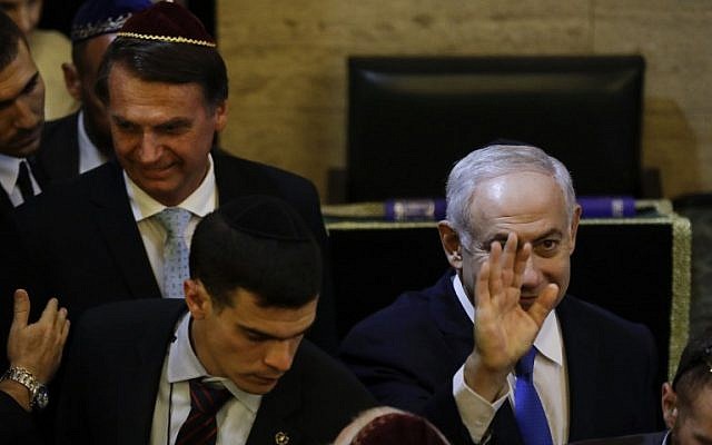 Brazil's President-elect Jair Bolsonaro (L) and Israel's Prime Minister Benjamin Netanyahu (R) are pictured upon arrival at a synagogue in the Copacabana neighborhood, in Rio de Janeiro, Brazil, on December 28, 2018. (Leo CORREA / POOL / AFP) Brazil's President-elect Jair Bolsonaro (L) and Israel's Prime Minister Benjamin Netanyahu (R) are pictured upon arrival at a synagogue in the Copacabana neighborhood, in Rio de Janeiro, Brazil, on December 28, 2018. (Leo CORREA / POOL / AFP)