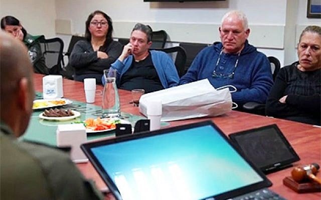 The families of terror victims Kim Levengrond Yehezkel and Ziv Hajbi meeting with the Border Police fighters who killed terrorist Ashraf Na'alowa, December 2018. (Border Police) The families of terror victims Kim Levengrond Yehezkel and Ziv Hajbi meeting with the Border Police fighters who killed terrorist Ashraf Na'alowa, December 2018. (Border Police)