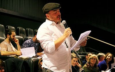 A participant joins in a 'Fiddler' reading at the Royal Theater in West Los Angeles, part of the Laemmle chain. (Courtesy of Laemmle.com/via JTA)