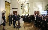 US President Donald Trump speaks at a Hanukkah reception in the East Room of the White House, December 6, 2018. (Oliver Contreras/Pool/Getty Images via JTA)