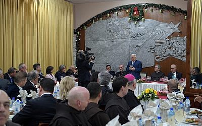 PA President Mahmoud Abbas speaking at a Christmas Eve dinner in Bethlehem, December 24, 2019. (Wafa)