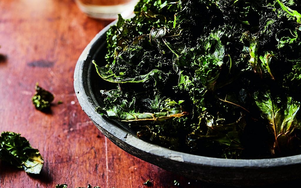 Crispy kale strips enhanced with poultry fat. (The Fat Kitchen © by Andrea Chesman. Photography/ © by Keller + Keller Photography/ Storey Publishing)
