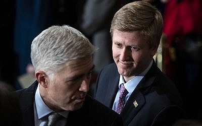 In a Monday, Dec. 3, 2018 file photo, Nick Ayers, right, listens as Supreme Court Associate Justice Neil Gorsuch waits for the arrival of the casket for former President George H.W. Bush to lie in State at the Capitol on Capitol Hill in Washington.(Jabin Botsford/The Washington Post via AP, Pool)
