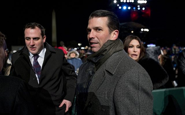 In this photo from November 28, 2018, Donald Trump Jr., center, and Kimberly Guilfoyle, right, depart following the National Christmas Tree lighting ceremony at the Ellipse near the White House in Washington. (AP Photo/Andrew Harnik, File) In this photo from November 28, 2018, Donald Trump Jr., center, and Kimberly Guilfoyle, right, depart following the National Christmas Tree lighting ceremony at the Ellipse near the White House in Washington. (AP Photo/Andrew Harnik, File)