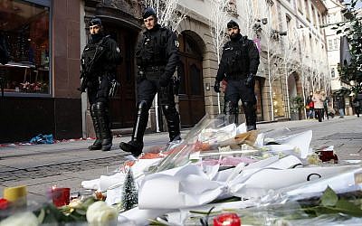 French police officers patrol in the streets of Strasbourg, France, on December 13, 2018, two days after a deadly terror attack in the city. (AP Photo/Christophe Ena)