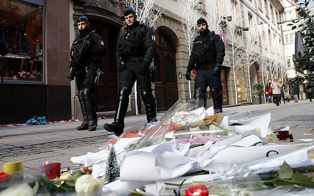 French police officers patrol in the streets of Strasbourg, France, on December 13, 2018, two days after a deadly terror attack in the city. (AP Photo/Christophe Ena)