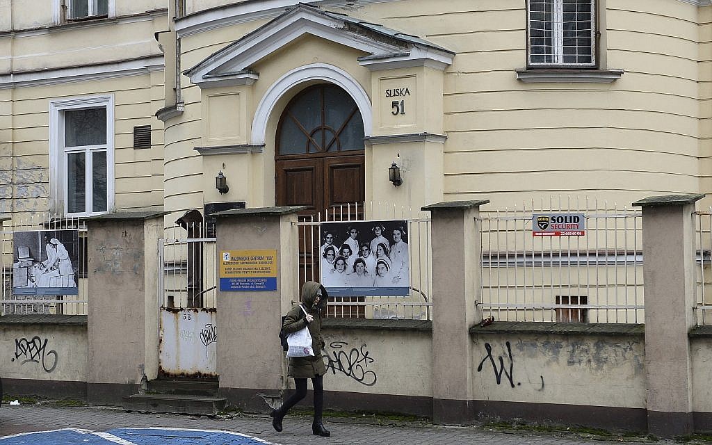 Illustrative: A person walks past the building where the 'Warsaw Ghetto Museum' will be located, in Warsaw, Poland, Friday, December 14, 2018. (AP photo/Alik Keplicz) Illustrative: A person walks past the building where the 'Warsaw Ghetto Museum' will be located, in Warsaw, Poland, Friday, December 14, 2018. (AP photo/Alik Keplicz)