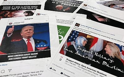 Some of the Facebook and Instagram ads linked to a Russian effort to disrupt the American political process and stir up tensions around divisive social issues, released by members of the US House Intelligence Committee, as photographed in Washington, DC, on November 1, 2017. (AP Photo/Jon Elswick)