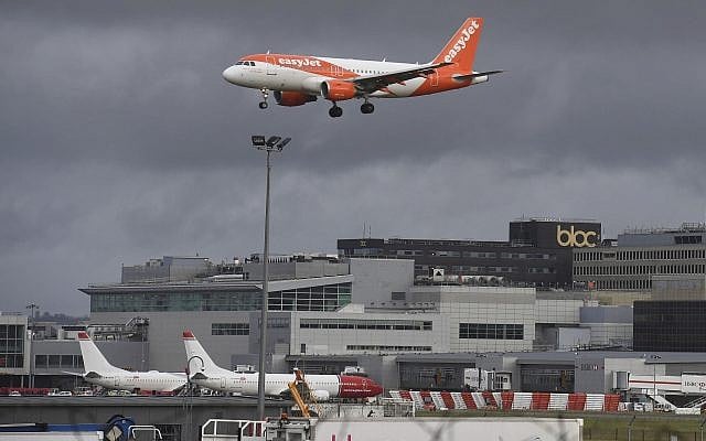 An EasyJet plane on its final approach before landing at Gatwick airport near London, on December 21, 2018. (John Stillwell/PA via AP)
