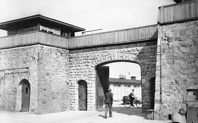 Illustrative: In this photo from 1945 the main gate is pictured at the Mauthausen Concentration Camp, near Linz, Austria. (AP Photo/Lynn Heinzerling, file) Illustrative: In this photo from 1945 the main gate is pictured at the Mauthausen Concentration Camp, near Linz, Austria. (AP Photo/Lynn Heinzerling, file)