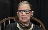 In this photo from November 30, 2018, Associate Justice Ruth Bader Ginsburg sits with fellow Supreme Court justices for a group portrait at the Supreme Court Building in Washington. (AP Photo/J. Scott Applewhite)