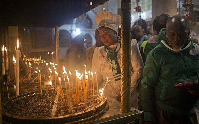A Christian worshiper prays at the Grotto, under the Church of the Nativity, traditionally recognized by Christians to be the birthplace of Jesus Christ, in the West Bank city of Bethlehem, December 23, 2018. (AP Photo/Nasser Nasser) A Christian worshiper prays at the Grotto, under the Church of the Nativity, traditionally recognized by Christians to be the birthplace of Jesus Christ, in the West Bank city of Bethlehem, December 23, 2018. (AP Photo/Nasser Nasser)