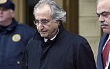 Bernard L. Madoff, the accused mastermind of a $50 billion Ponzi scheme, leaves Federal Court in New York on January 14, 2009. ( AP/Stuart Ramson)