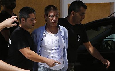 Seif al-Din MohamedIn this Friday, April 22, 2016 file photo, EgyptAir plane hijacking suspect Seif al-Din Mohamed Mostafa, 59, center, is escorted by Cyprus police officers as he arrives in a court in capital Nicosia, Cyprus (AP Photo/Petros Karadjias, File)