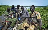 In this photo taken August 19, 2017,  government soldiers cross over to the west bank of the Nile in order to patrol the front lines, in the town of Kuek, northern Upper Nile state, South Sudan. (AP/Sam Mednick)