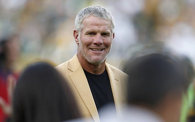 Hall of Fame quarterback Brett Favre is shown during a halftime ceremony of an NFL football game against the Dallas Cowboys, in Green Bay, Wisconsin, October 16, 2016. (AP Photo/Matt Ludtke, File) Hall of Fame quarterback Brett Favre is shown during a halftime ceremony of an NFL football game against the Dallas Cowboys, in Green Bay, Wisconsin, October 16, 2016. (AP Photo/Matt Ludtke, File)