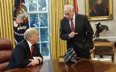 US President Donald Trump listens to White House Chief of Staff John Kelly, right, in the Oval Office of the White House on October 10, 2018. (AP Photo/Pablo Martinez Monsivais)
