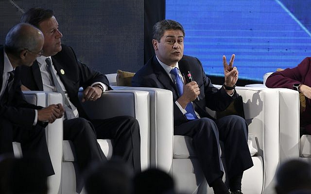 Honduras' President Juan Orlando Hernandez talks during an economic forum as part the XXVI Iberoamerican Summit in Antigua, Guatemala, November 15, 2018 (AP Photo/Moises Castillo) Honduras' President Juan Orlando Hernandez talks during an economic forum as part the XXVI Iberoamerican Summit in Antigua, Guatemala, November 15, 2018 (AP Photo/Moises Castillo)