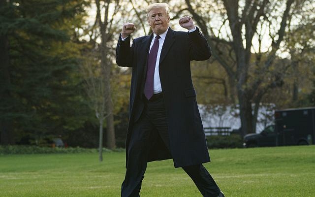 US President Donald Trump gestures as he walks to Marine One after speaking to media at the White House in Washington on November 20, 2018, for the short trip to Andrews Air Force Base en route to Palm Beach International Airport, in West Palm Beach, Florida, and on to Mar-a-Lago. (AP Photo/Carolyn Kaster) US President Donald Trump gestures as he walks to Marine One after speaking to media at the White House in Washington on November 20, 2018, for the short trip to Andrews Air Force Base en route to Palm Beach International Airport, in West Palm Beach, Florida, and on to Mar-a-Lago. (AP Photo/Carolyn Kaster)