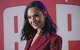 Actress Gal Gadot poses for photographers upon arrival at the premiere of the film 'Ralph Breaks the Internet' in central London on November 25, 2018. (Joel C Ryan/Invision/AP)