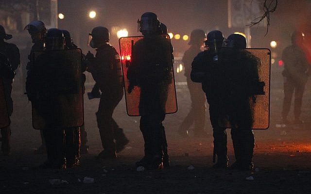 French riot police officers take position during a demonstration, Dec.1, 2018 in Paris (AP Photo/Thibault Camus)