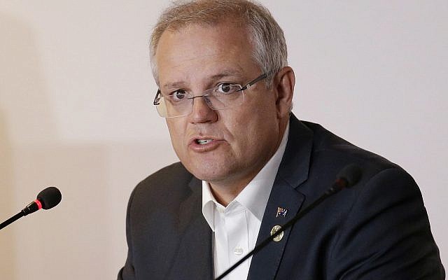 In this Nov. 18, 2018, file photo, Australian Prime Minister Scott Morrison speaks during the APEC 2018 meetings in Port Moresby, Papua New Guinea. (AP/Aaron Favila) In this Nov. 18, 2018, file photo, Australian Prime Minister Scott Morrison speaks during the APEC 2018 meetings in Port Moresby, Papua New Guinea. (AP/Aaron Favila)