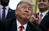 President Donald Trump speaks during a signing ceremony for criminal justice reform legislation in the Oval Office of the White House, December 21, 2018, in Washington. (AP Photo/Evan Vucci)