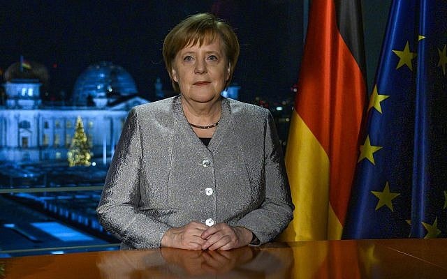 German Chancellor Angela Merkel poses for a photograph after the recording of her annual New Year's speech at the Chancellery in Berlin, Germany, Sunday, Dec. 30, 2018. (John MacDougall/pool photo via AP) German Chancellor Angela Merkel poses for a photograph after the recording of her annual New Year's speech at the Chancellery in Berlin, Germany, Sunday, Dec. 30, 2018. (John MacDougall/pool photo via AP)