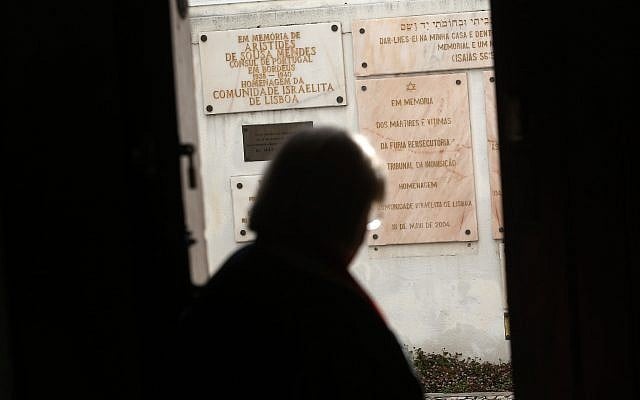 A Jewish woman walks past memorials stones at the main Jewish synagogue in Lisbon, May 5, 2015. (Francisco Seco/AP) A Jewish woman walks past memorials stones at the main Jewish synagogue in Lisbon, May 5, 2015. (Francisco Seco/AP)