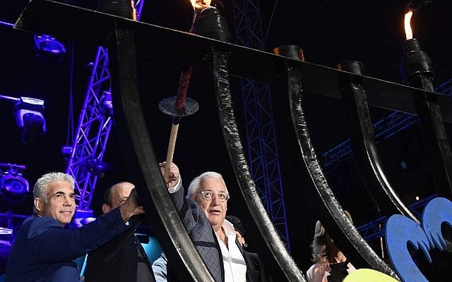 US Ambassador David Friedman, left, lighting a Hanukkah menorah, at the Sultan's Pool in Jerusalem, on December 3, 2018. (Matty Stern/ US Embassy) US Ambassador David Friedman, left, lighting a Hanukkah menorah, at the Sultan's Pool in Jerusalem, on December 3, 2018. (Matty Stern/ US Embassy)