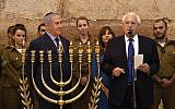US Ambassador to Israel David Friedman, second right, and his wife Tammy, third right, join Prime Minister Benjamin Netanyahu, front left, at Jerusalem’s Western Wall for a candle-lighting ceremony marking the fifth night of Hanukkah and one year since US President Donald Trump’s December 6, 2017 declaration on moving the US Embassy to Jerusalem. (Matty Stern/US Embassy Jerusalem)
