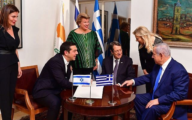 Prime Minister Benjamin Netanyahu (R) and his wife Sara (2R) host Cypriot President Nicos Anastasiades (CR)and his wife Andri Moustakoudi (L)and Greek Prime Minister Tsipras (@L)and his partner Peristera Baziana (L) on December 19, 2018 in Jerusalem. (Kobi Gideon/GPO) Prime Minister Benjamin Netanyahu (R) and his wife Sara (2R) host Cypriot President Nicos Anastasiades (CR)and his wife Andri Moustakoudi (L)and Greek Prime Minister Tsipras (@L)and his partner Peristera Baziana (L) on December 19, 2018 in Jerusalem. (Kobi Gideon/GPO)