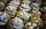 Doughnuts on sale at the Roladin bakery in central Jerusalem, during the Jewish holiday of Hanukkah, December 12, 2017. (Flash90)