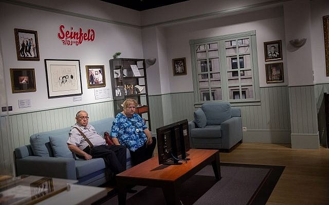 Visitors at the "Let There Be Laughter – Jewish Humor Around the World" exhibit at the Museum of the Jewish People at Beit Hatfutsot on August 13, 2018. (Miriam Alster/Flash90) Visitors at the "Let There Be Laughter – Jewish Humor Around the World" exhibit at the Museum of the Jewish People at Beit Hatfutsot on August 13, 2018. (Miriam Alster/Flash90)