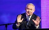 Prime Minister Benjamin Netanyahu speaks at a Likud party event in Ramat Gan, marking the first night of the Jewish holiday of Hanukkah, on December 2, 2018. (Miriam Alster/Flash90)