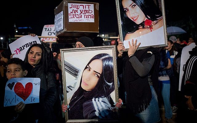Thousands rally at Tel Aviv's Rabin Square as part of a nationwide strike protesting the violence against women, December 4, 2018 (Miriam Alster/Flash90)