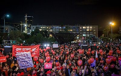 Thousands rally at Tel Aviv's Rabin Square as part of a nationwide strike protesting the violence against women, December 4, 2018 (Miriam Alster/Flash90)