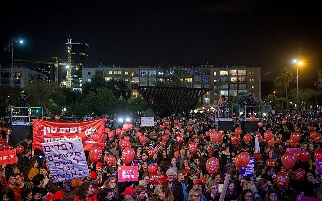 Thousands rally at Tel Aviv's Rabin Square as part of a nationwide strike protesting the violence against women, December 4, 2018 (Miriam Alster/Flash90)