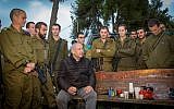 Prime Minister Benjamin Netanyahu speaks with soldiers during a visit to the Northern Command base in Safed, December 11, 2018 (Basel Awidat/Flash90)