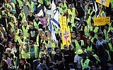 'Yellow vest' protests reach Israel with hundreds marching against the rising cost of living in central Tel Aviv on December 14, 2018. (Miriam Alster/Flash90)