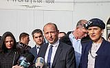 Education Minister and leader of the Jewish Home party Naftali Bennett speaks with the media as he arrives for a special faction meeting in the Israeli outpost of Givat Assaf, in the West Bank on December 17, 2018. (Yonatan Sindel/Flash90)