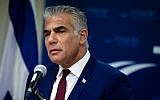 Yesh Atid leader MK Yair Lapid speaks to the media in the Knesset, on December 24, 2018. (Yonatan Sindel/Flash90)