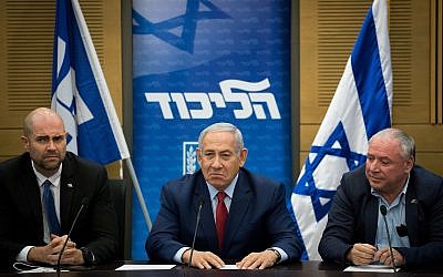 Prime Minister Benjamin Netanyahu, center, at a Likud faction meeting on December 24, 2018. (Yonatan Sindel/Flash90)