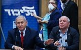 Prime Minister Benjamin Netanyahu leads a Likud faction meeting in the Knesset on December 24, 2018, confirming early elections. At his side is coalition chief David (Dudi) Amsalem (Yonatan Sindel/FLASH90)