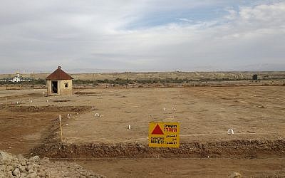 White markers denote places where sappers believe there are mines that need to be excavated by hand in the Russian monastery compound on December 9, 2018. (Melanie Lidman/Times of Israel)
