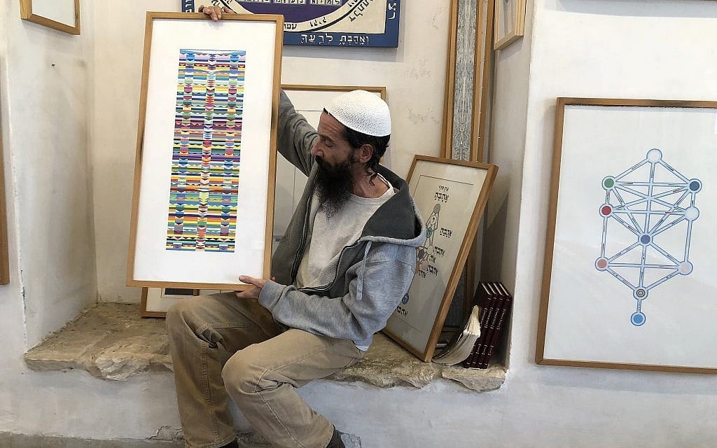 Avraham Loewenthal took his Chicago Art Institute training to Safed, where he's been making mystical etchings since 1995 (Jessica Steinberg/Times of Israel)
